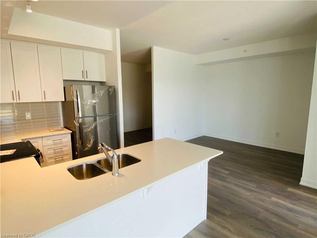 213-550 North Service Road, Grimsby, ON - Indoor Photo Showing Kitchen With Double Sink