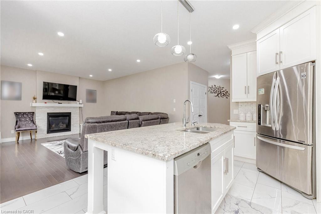 263 Wedgewood Drive, Woodstock, ON - Indoor Photo Showing Kitchen With Fireplace With Double Sink With Upgraded Kitchen