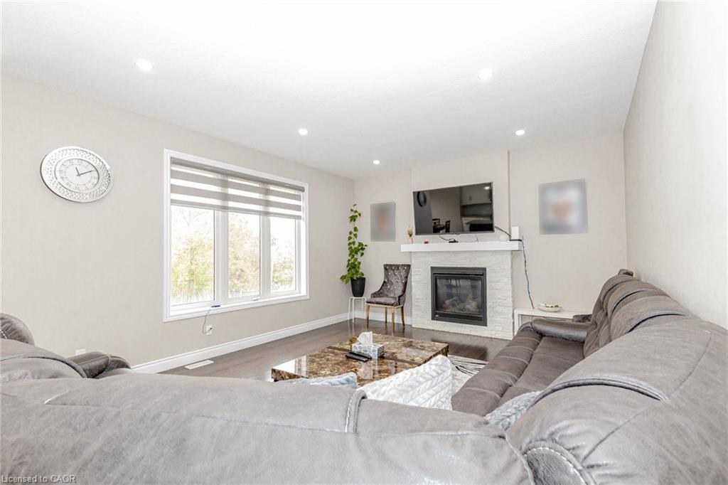 263 Wedgewood Drive, Woodstock, ON - Indoor Photo Showing Living Room With Fireplace