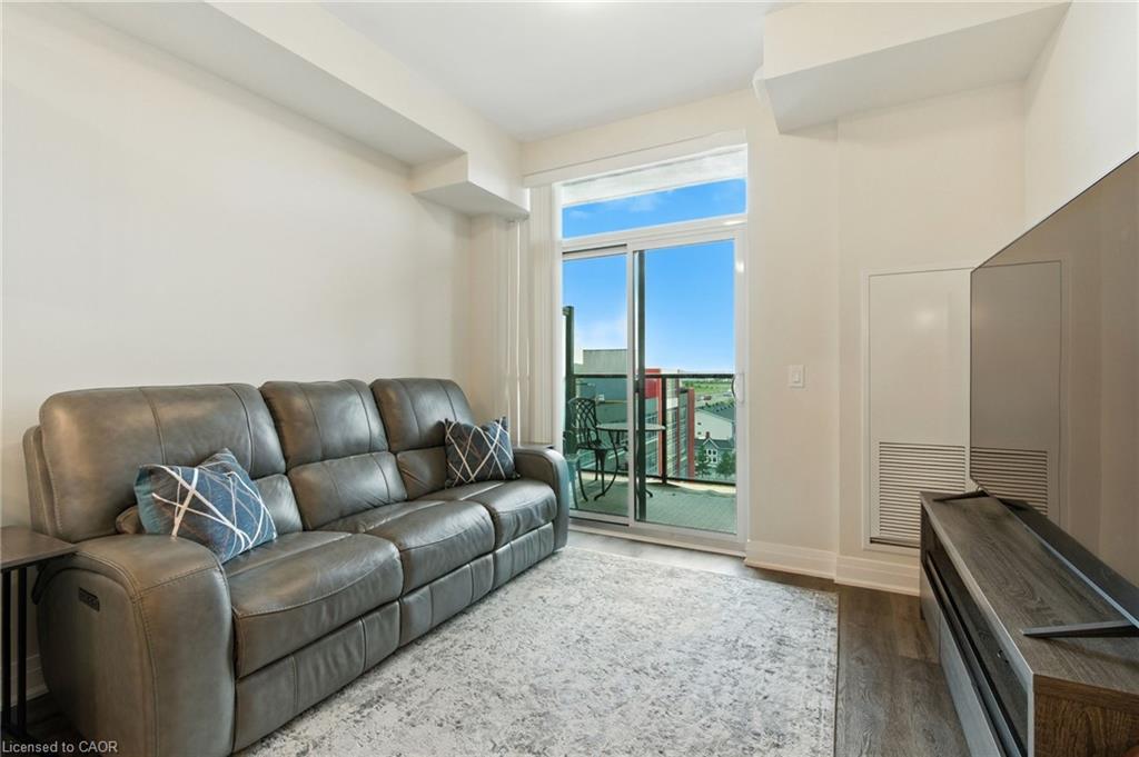 803-16 Concord Place, Grimsby, ON - Indoor Photo Showing Living Room