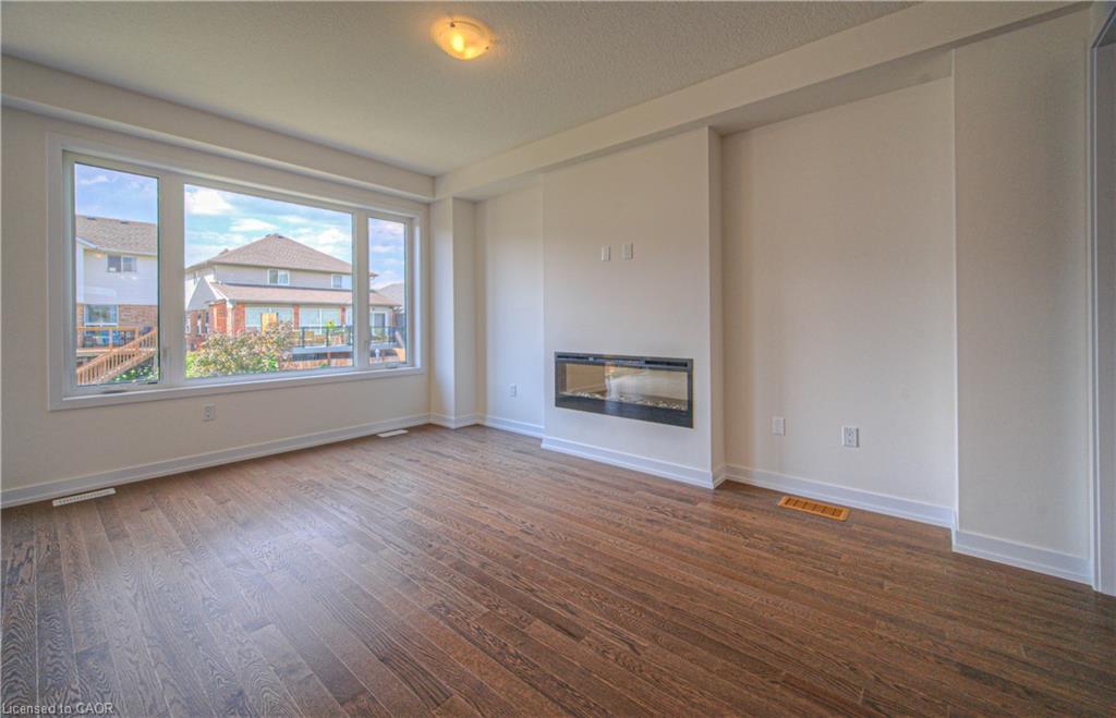 100 Moss Drive Drive, Cambridge, ON - Indoor Photo Showing Living Room With Fireplace