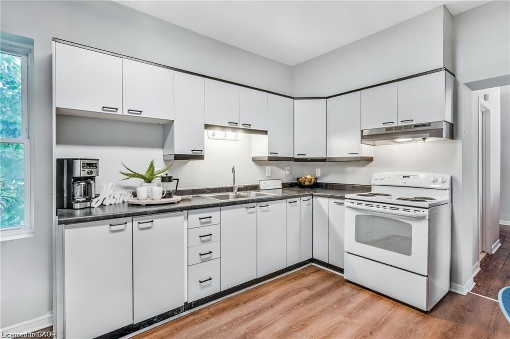 118 Queen Street S, Hamilton, ON - Indoor Photo Showing Kitchen With Double Sink