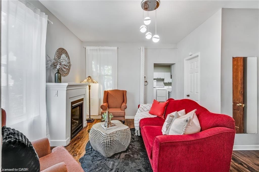 118 Queen Street S, Hamilton, ON - Indoor Photo Showing Living Room With Fireplace