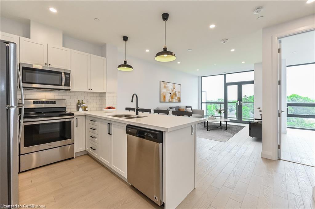 507-101 Locke Street S, Hamilton, ON - Indoor Photo Showing Kitchen With Stainless Steel Kitchen With Double Sink With Upgraded Kitchen
