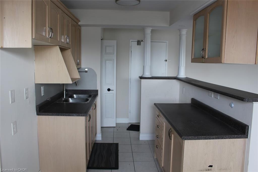 204-851 Queenston Road, Hamilton, ON - Indoor Photo Showing Kitchen With Double Sink