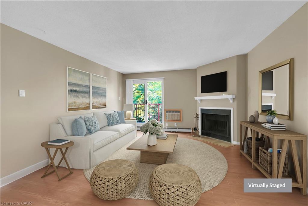 733-1510 Pilgrims Way, Oakville, ON - Indoor Photo Showing Living Room With Fireplace