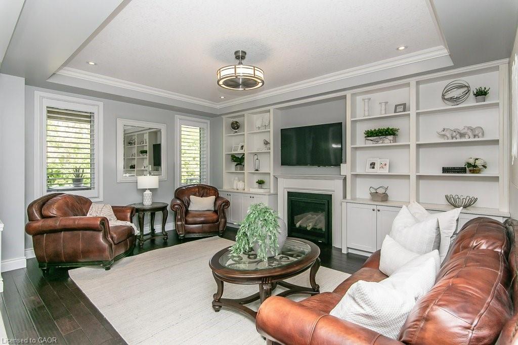 19 Tremaine Drive, Kitchener, ON - Indoor Photo Showing Living Room With Fireplace