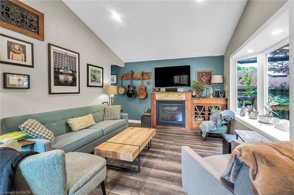 321 East 12Th Street, Hamilton, ON - Indoor Photo Showing Living Room With Fireplace
