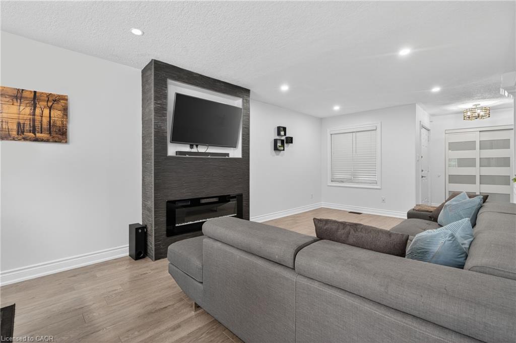 19 Marl Meadow Drive, Kitchener, ON - Indoor Photo Showing Living Room With Fireplace