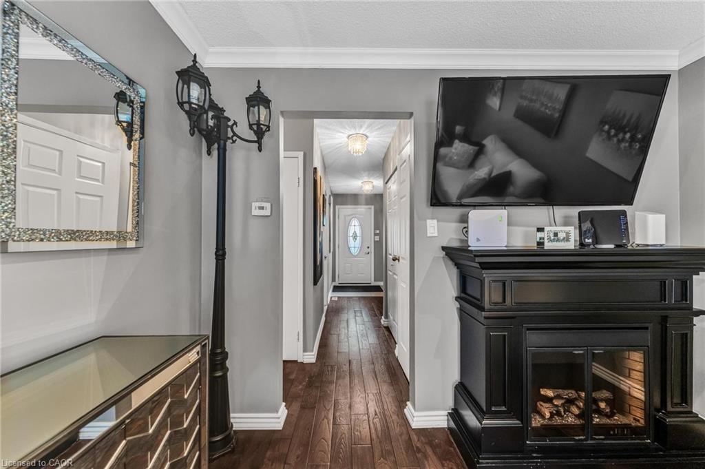 48-860 Rymal Road E, Hamilton, ON - Indoor With Fireplace