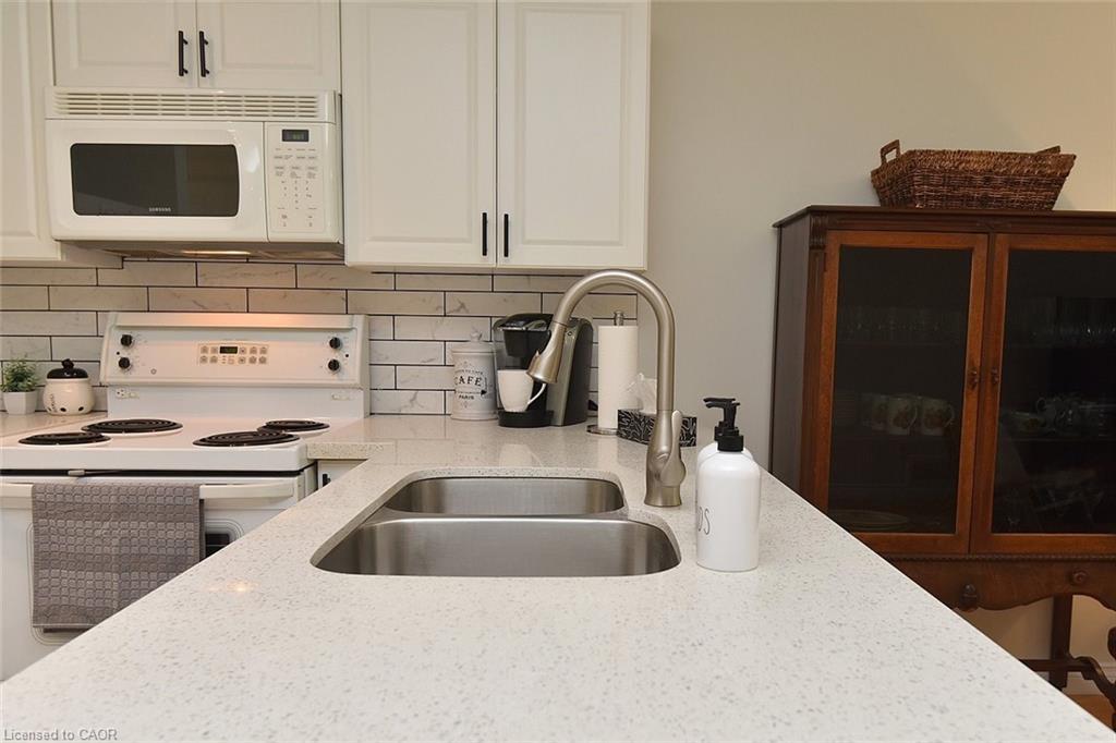 13-243 Fennell Avenue E, Hamilton, ON - Indoor Photo Showing Kitchen With Double Sink