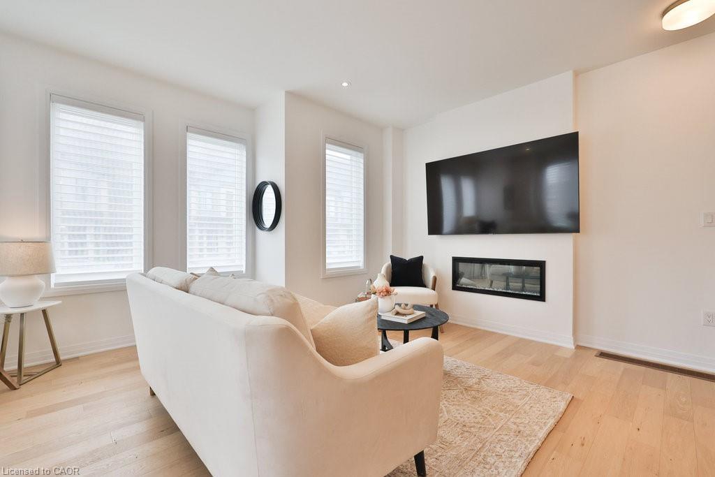 9 Crown Gate, Oakville, ON - Indoor Photo Showing Living Room With Fireplace