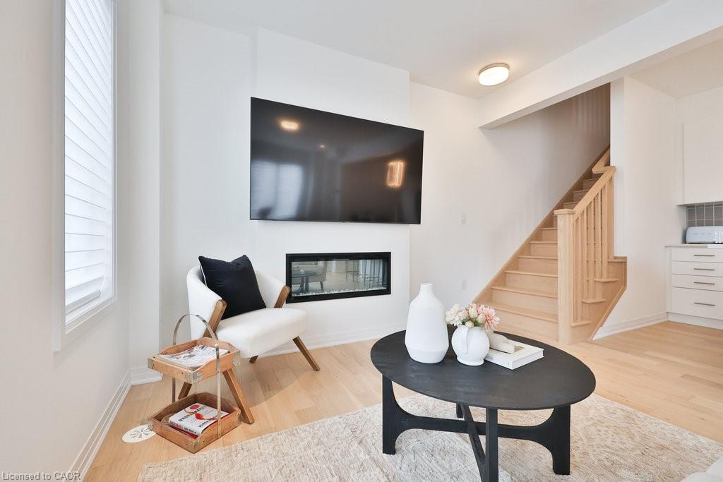 9 Crown Gate, Oakville, ON - Indoor Photo Showing Living Room With Fireplace