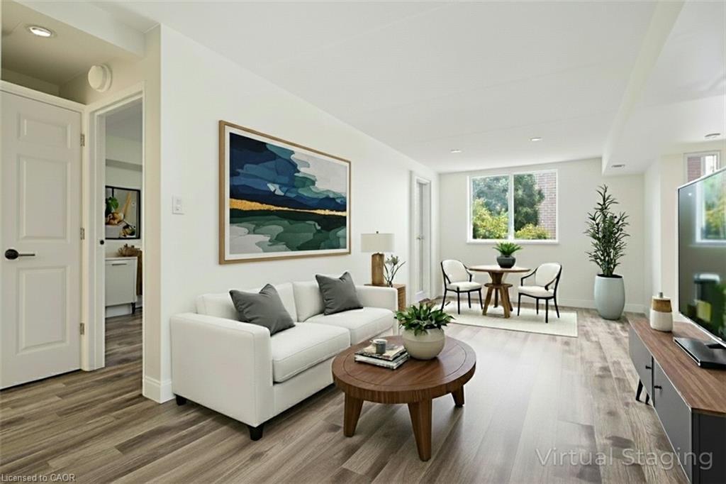 211-3499 Upper Middle Road, Burlington, ON - Indoor Photo Showing Living Room