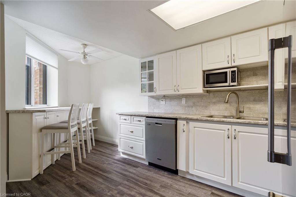 211-3499 Upper Middle Road, Burlington, ON - Indoor Photo Showing Kitchen With Double Sink