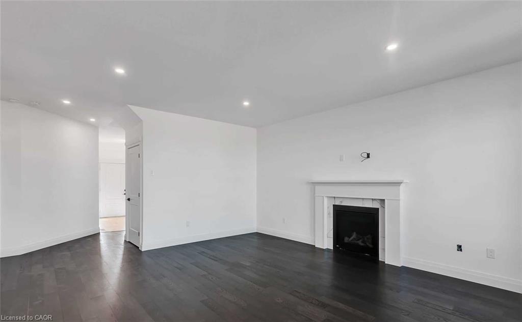 28 Rosina Lane, Thamesford, ON - Indoor Photo Showing Living Room With Fireplace