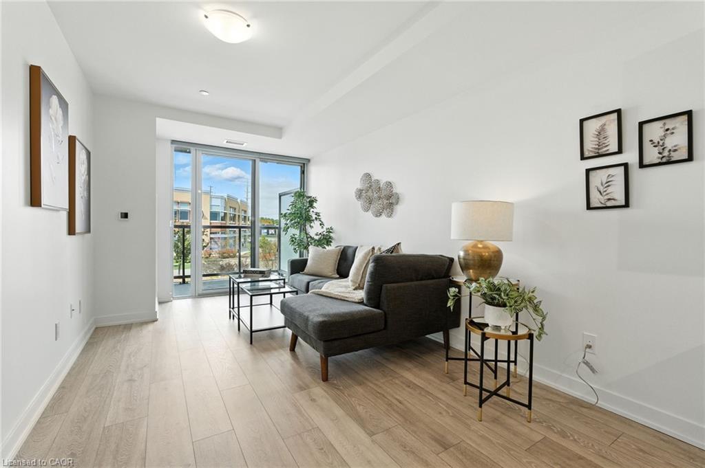 A220-3210 Dakota Common, Burlington, ON - Indoor Photo Showing Living Room