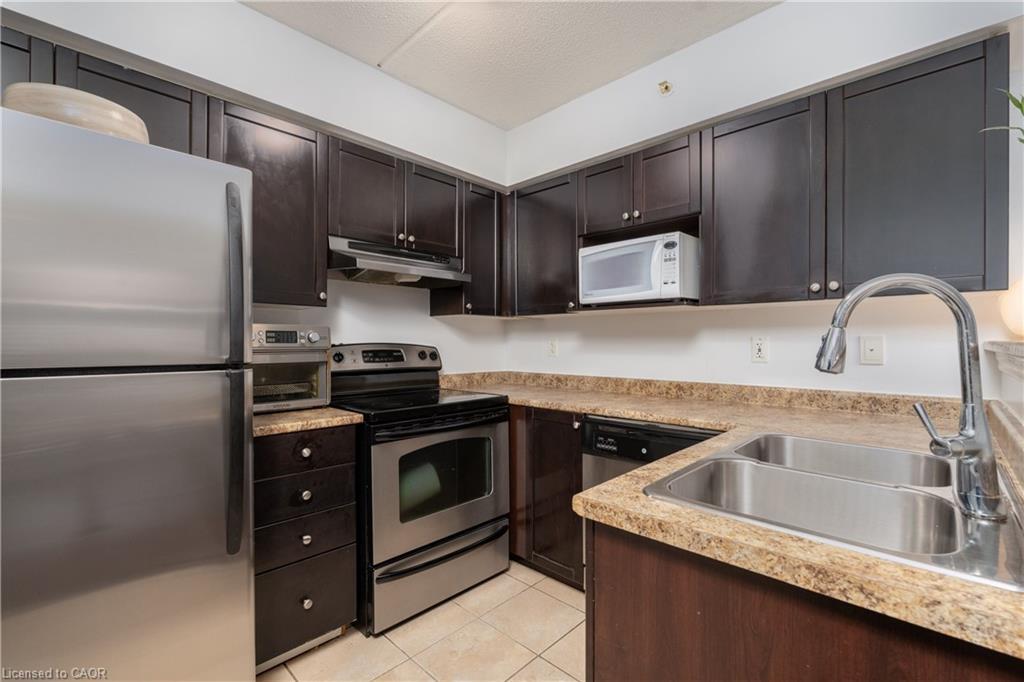 208-1350 Main Street, Milton, ON - Indoor Photo Showing Kitchen With Stainless Steel Kitchen With Double Sink