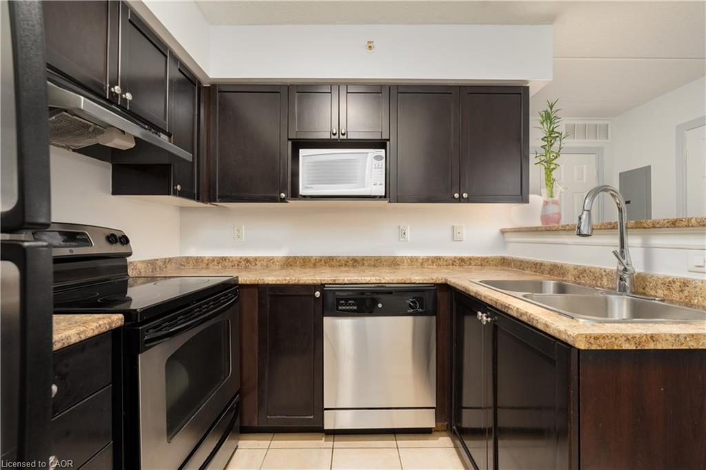 208-1350 Main Street, Milton, ON - Indoor Photo Showing Kitchen With Double Sink