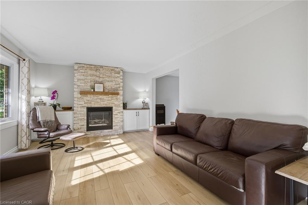 119 Oak Street, Simcoe, ON - Indoor Photo Showing Living Room With Fireplace