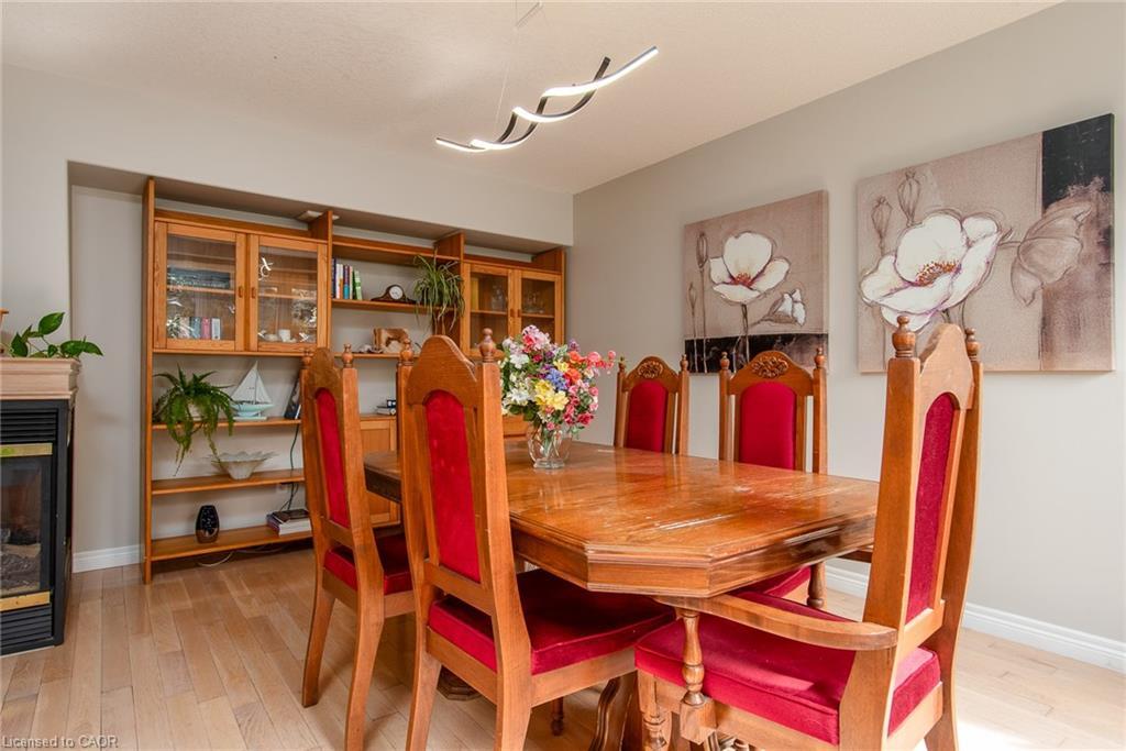 11 Apple Ridge Drive, Kitchener, ON - Indoor Photo Showing Dining Room With Fireplace