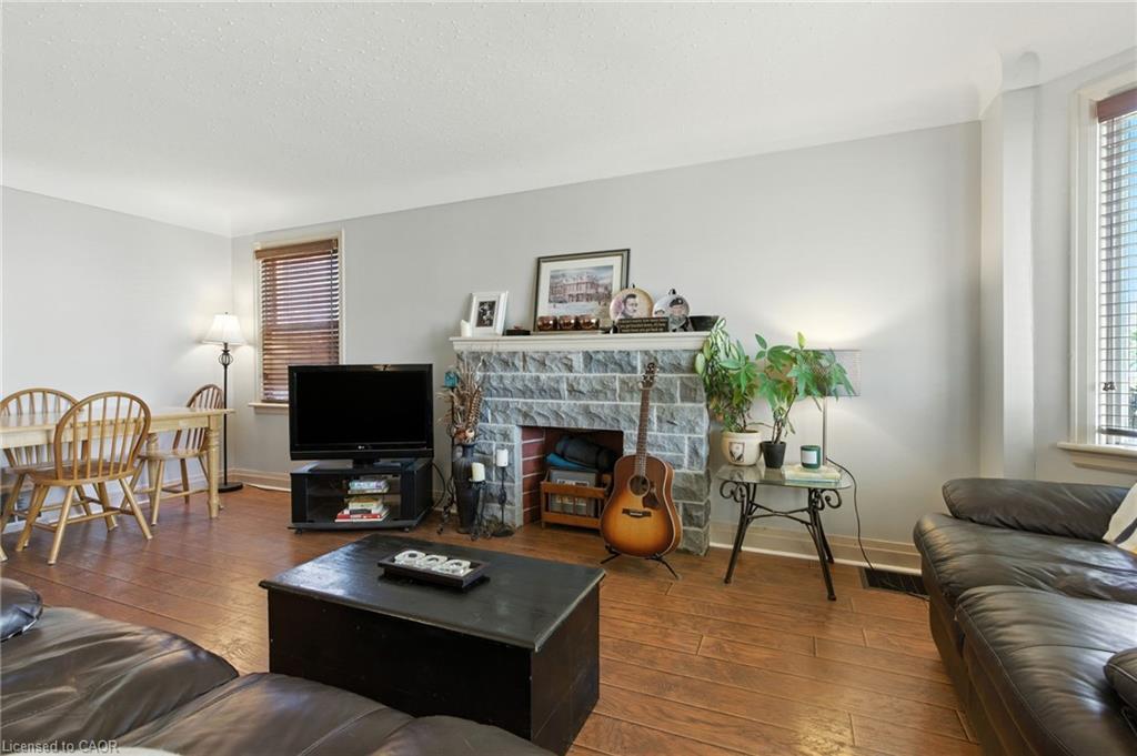608 Fennell Avenue E, Hamilton, ON - Indoor Photo Showing Living Room With Fireplace