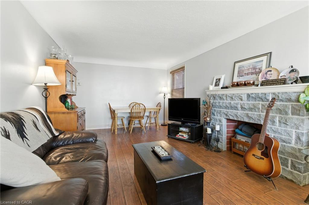 608 Fennell Avenue E, Hamilton, ON - Indoor Photo Showing Living Room With Fireplace