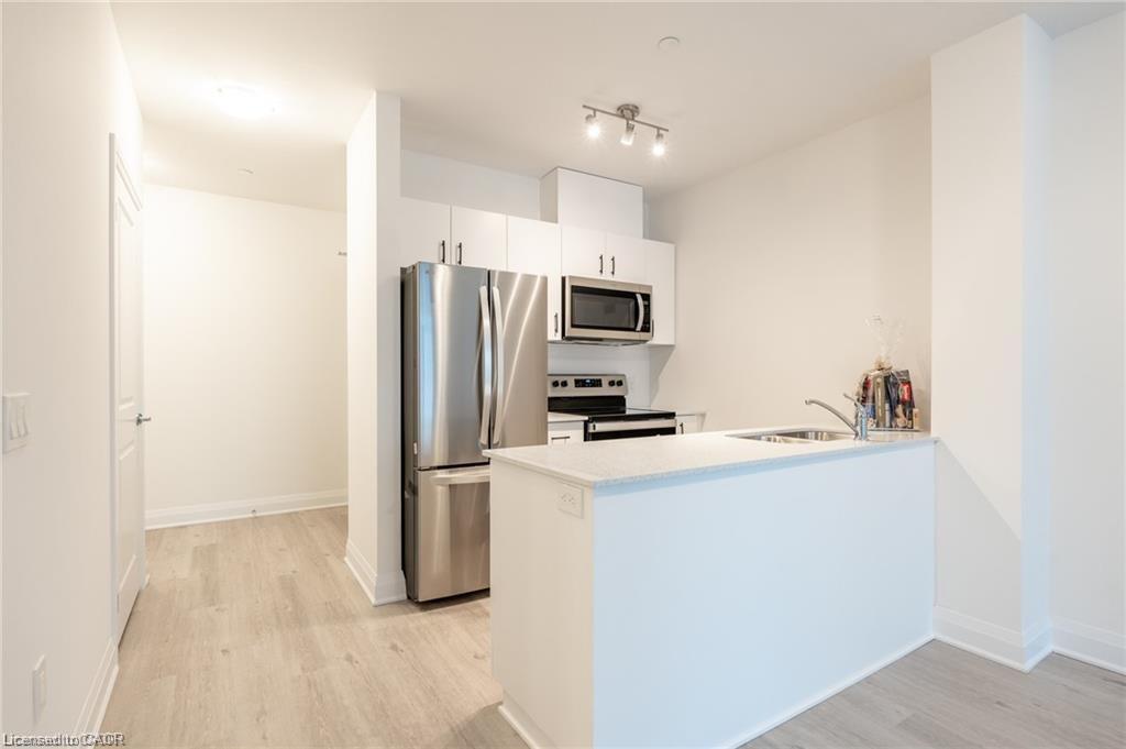 512-1936 Rymal Road E, Hamilton, ON - Indoor Photo Showing Kitchen With Stainless Steel Kitchen