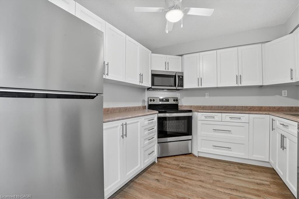 506-3227 King Street E, Kitchener, ON - Indoor Photo Showing Kitchen With Stainless Steel Kitchen