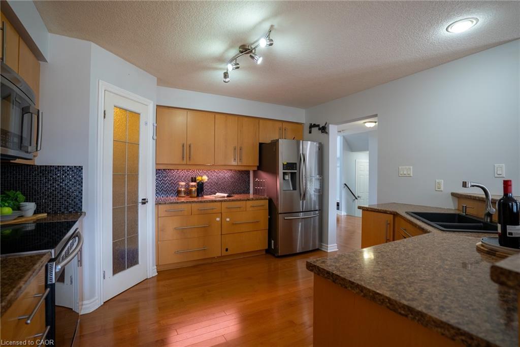 2427 Asima Drive, London, ON - Indoor Photo Showing Kitchen With Stainless Steel Kitchen With Double Sink