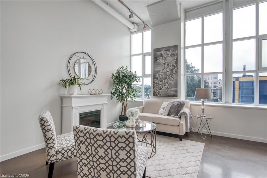 212-404 King Street W, Kitchener, ON - Indoor Photo Showing Living Room With Fireplace
