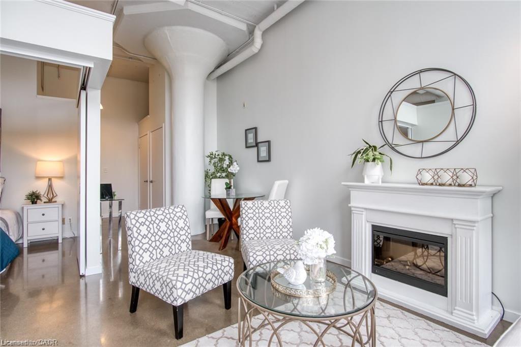 212-404 King Street W, Kitchener, ON - Indoor Photo Showing Living Room With Fireplace
