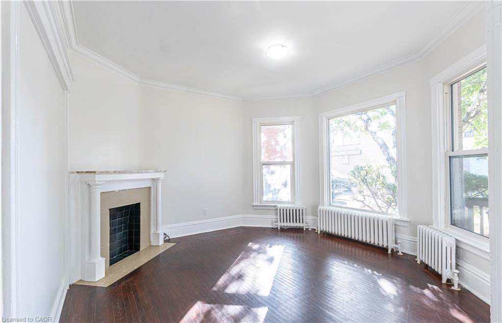 87 Gage Avenue S, Hamilton, ON - Indoor With Fireplace