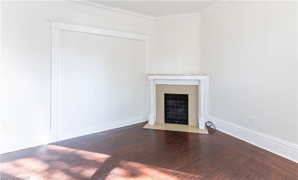 87 Gage Avenue S, Hamilton, ON - Indoor Photo Showing Living Room With Fireplace
