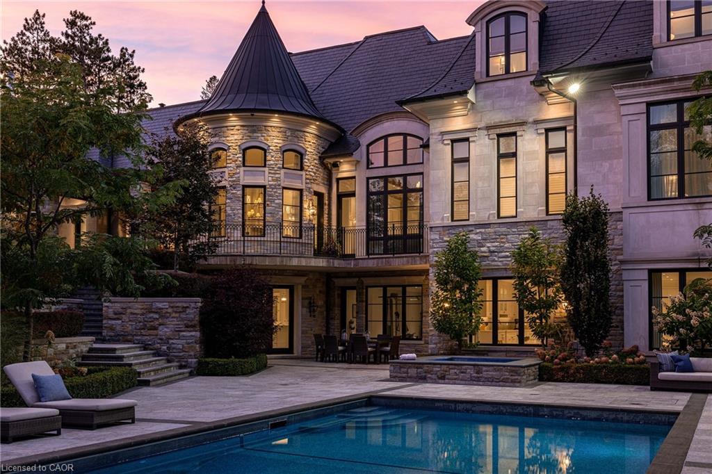 121 Rebecca Court, Maple, ON - Outdoor With In Ground Pool With Facade