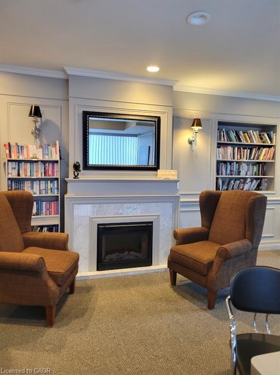 512-55 Blue Springs Drive, Waterloo, ON - Indoor Photo Showing Living Room With Fireplace