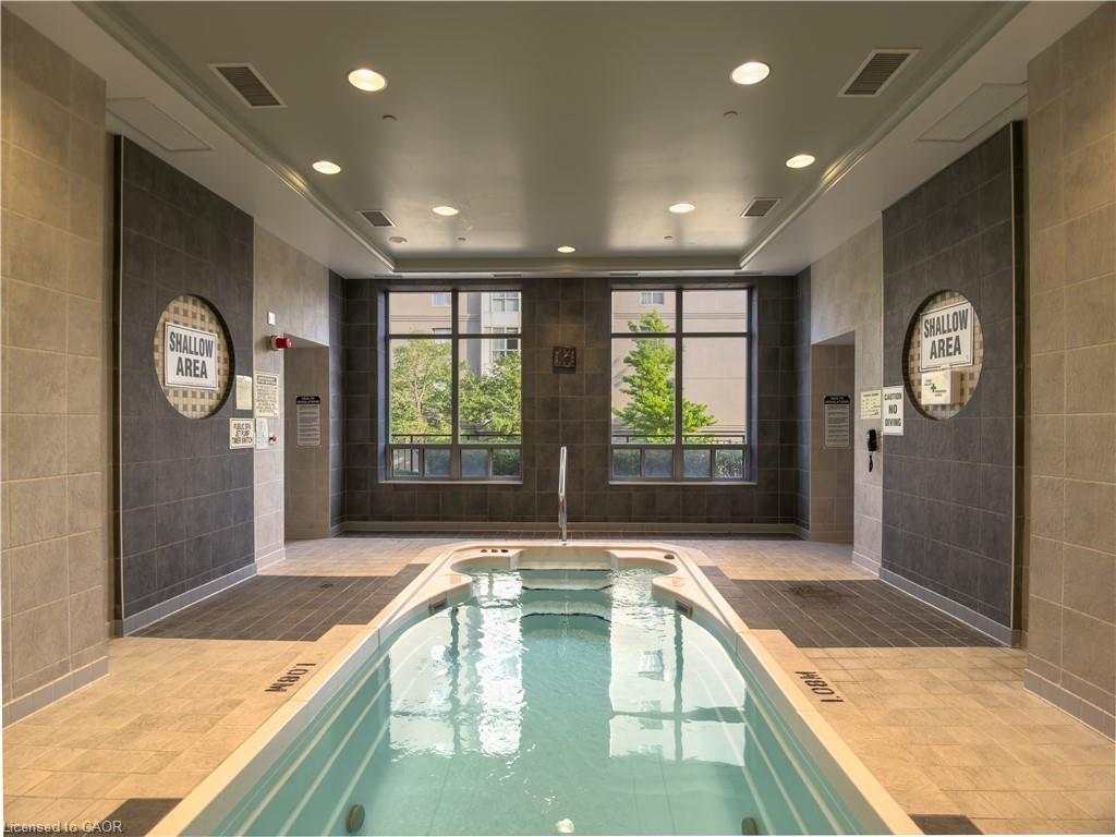 1413-55 Strathaven Road, Mississauga, ON - Indoor Photo Showing Other Room With In Ground Pool