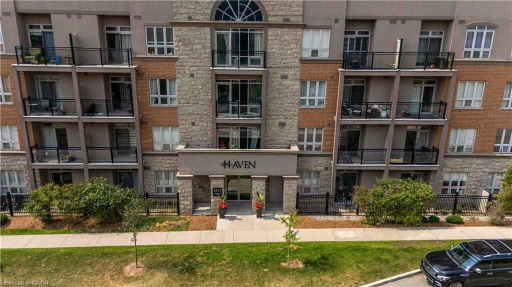 422-5317 Upper Middle Road, Burlington, ON - Outdoor With Balcony With Facade
