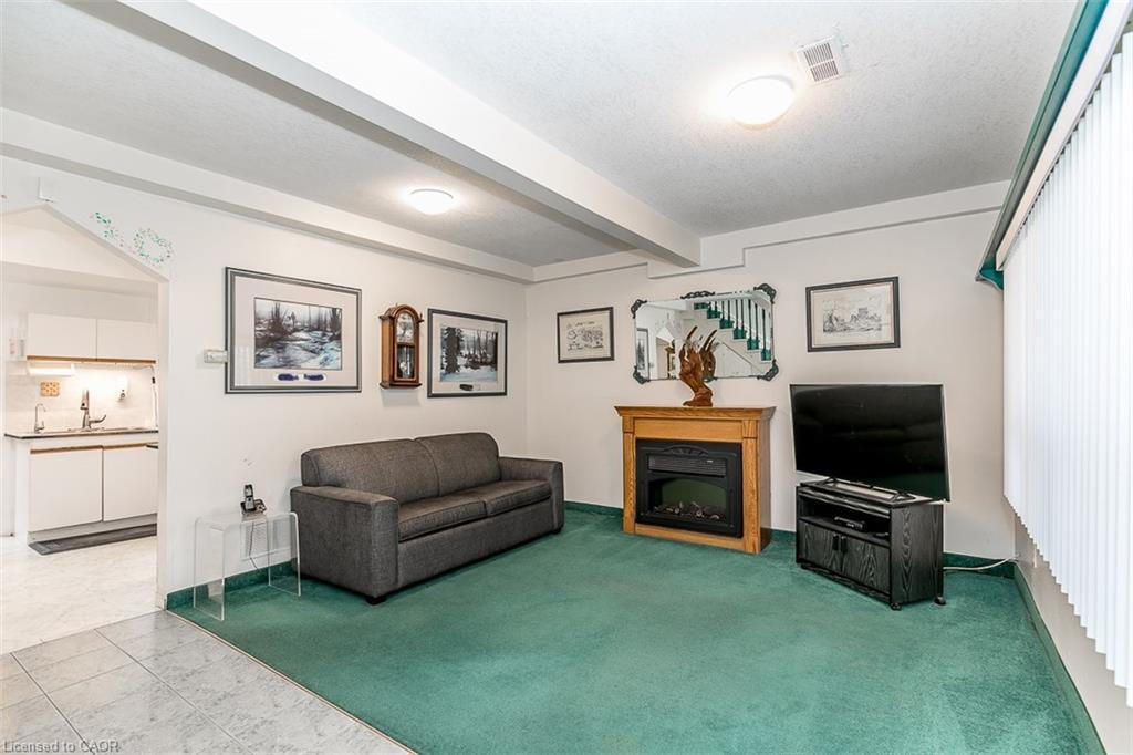 7941 Highway 26, Clearview, ON - Indoor Photo Showing Living Room With Fireplace