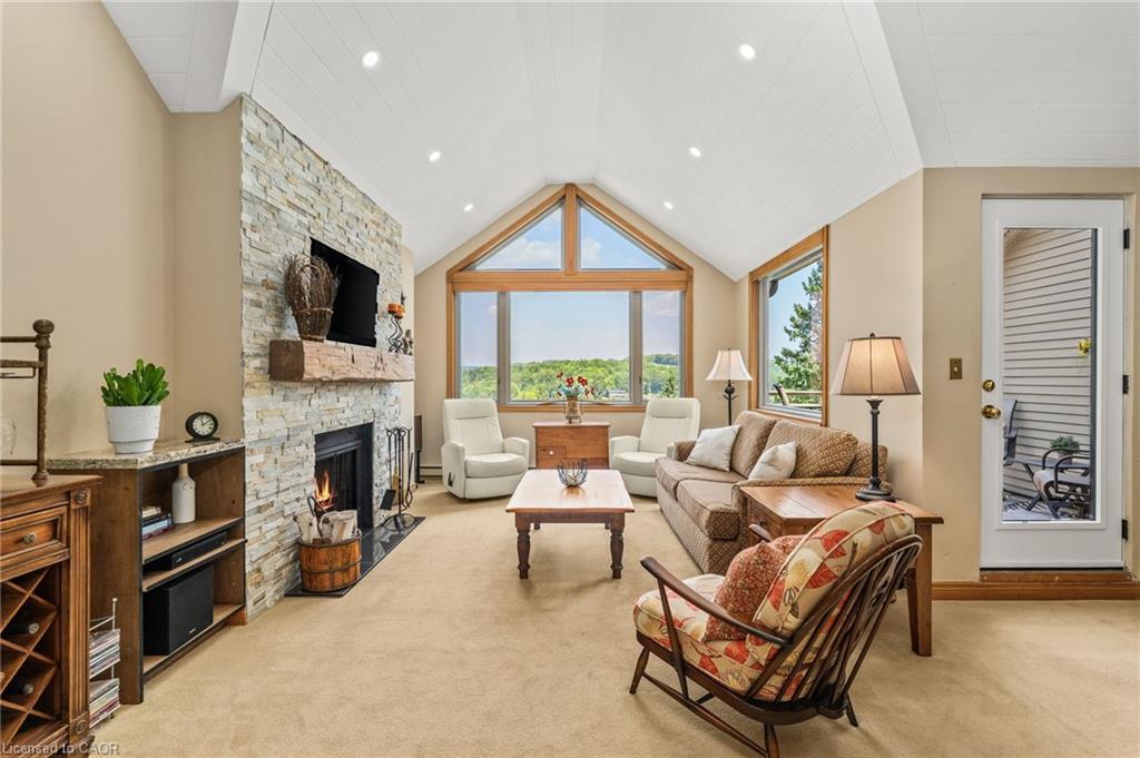 1-131 Grandview Hilltop Drive, Huntsville, ON - Indoor Photo Showing Living Room With Fireplace
