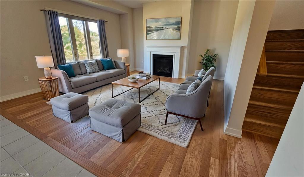 23 Tulip Crescent, Simcoe, ON - Indoor Photo Showing Living Room With Fireplace