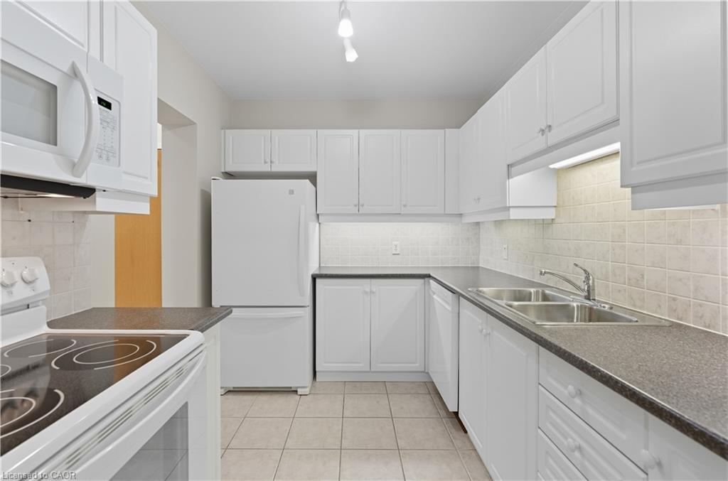 211-2075 Amherst Heights Drive, Burlington, ON - Indoor Photo Showing Kitchen With Double Sink
