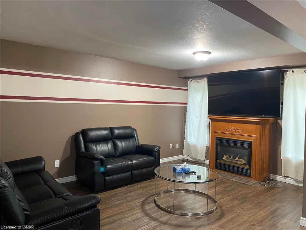 226 Bush Clover Crescent, Kitchener, ON - Indoor Photo Showing Living Room With Fireplace