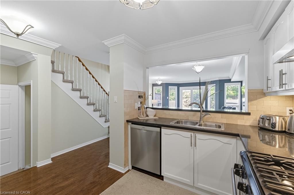 8-5555 Prince William Drive, Burlington, ON - Indoor Photo Showing Kitchen With Double Sink