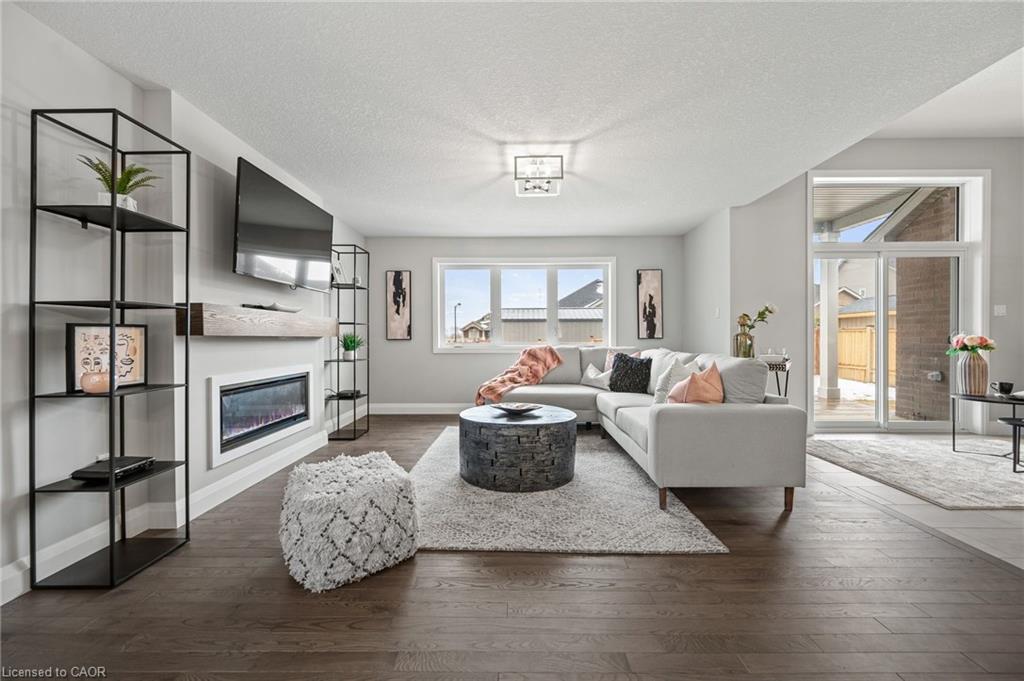 130 Stephenson Way, Minto, ON - Indoor Photo Showing Living Room With Fireplace
