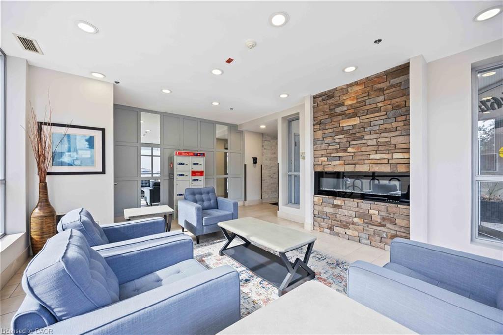 505-2464 Weston Road, Toronto, ON - Indoor Photo Showing Living Room With Fireplace