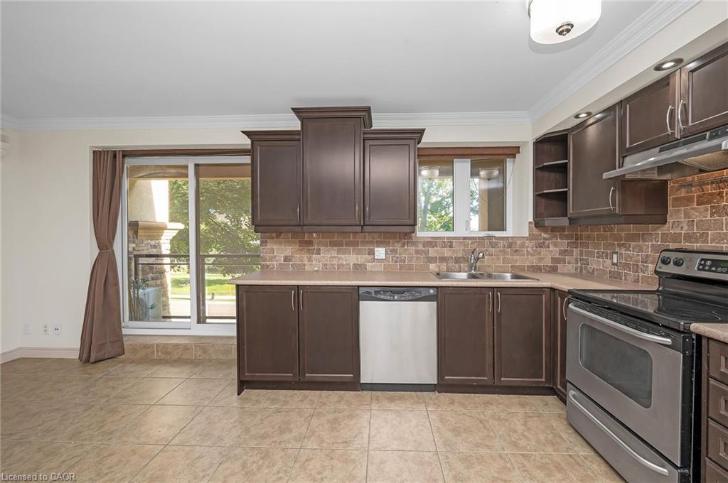 303-1212 Fennell Avenue E, Hamilton, ON - Indoor Photo Showing Kitchen With Stainless Steel Kitchen With Double Sink With Upgraded Kitchen