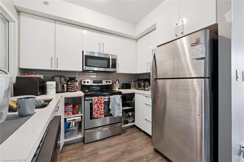 220-1291 Gordon Street, Guelph, ON - Indoor Photo Showing Kitchen With Stainless Steel Kitchen
