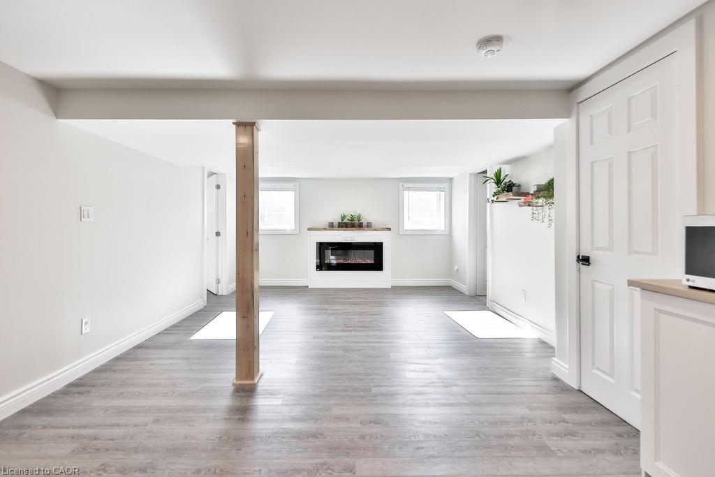 Lower-47 Castlefield Drive, Hamilton, ON - Indoor Photo Showing Living Room With Fireplace