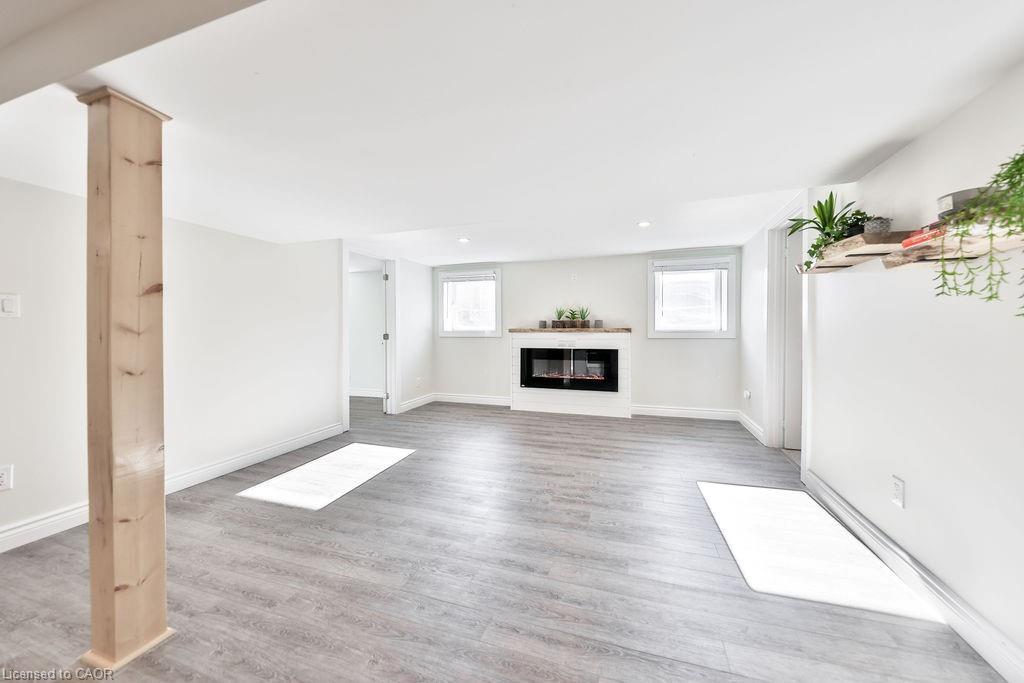 Lower-47 Castlefield Drive, Hamilton, ON - Indoor Photo Showing Other Room With Fireplace